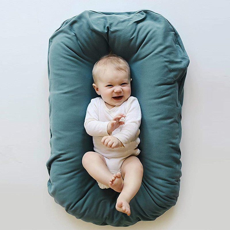 Cama Nido Biónica Portátil con Diseño Uterino para Bebé